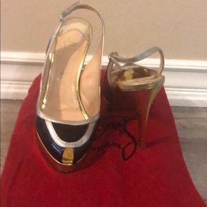Christian louboutin gold and black slingbacks